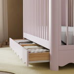 Casablanca blush crib with drawer close up of drawer in nursery