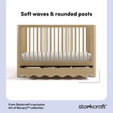 Casablanca driftwood crib front view showing soft waves and rounded posts callout image