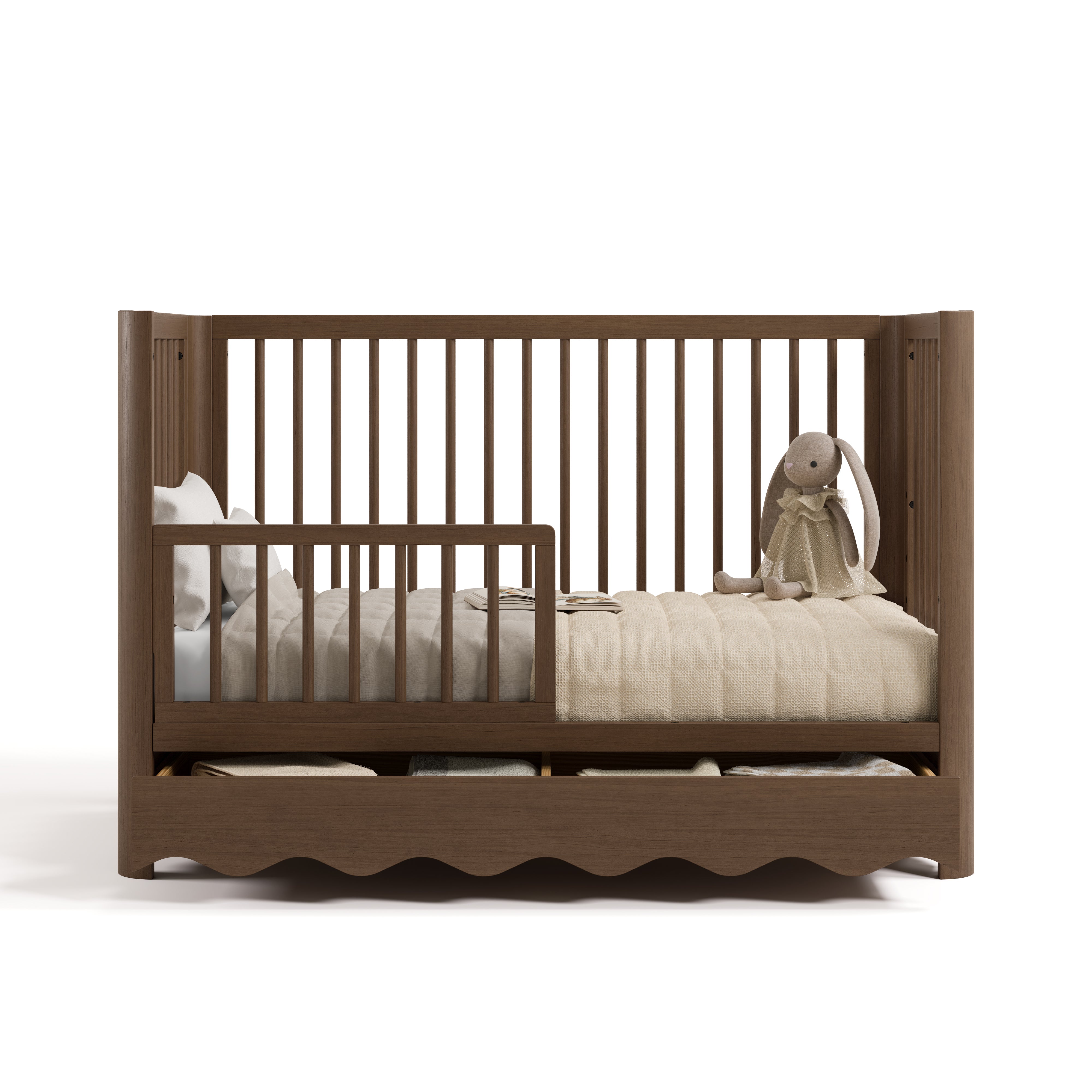 Casablanca hazelnut crib with drawer converted to toddler bed with guardrail attached
