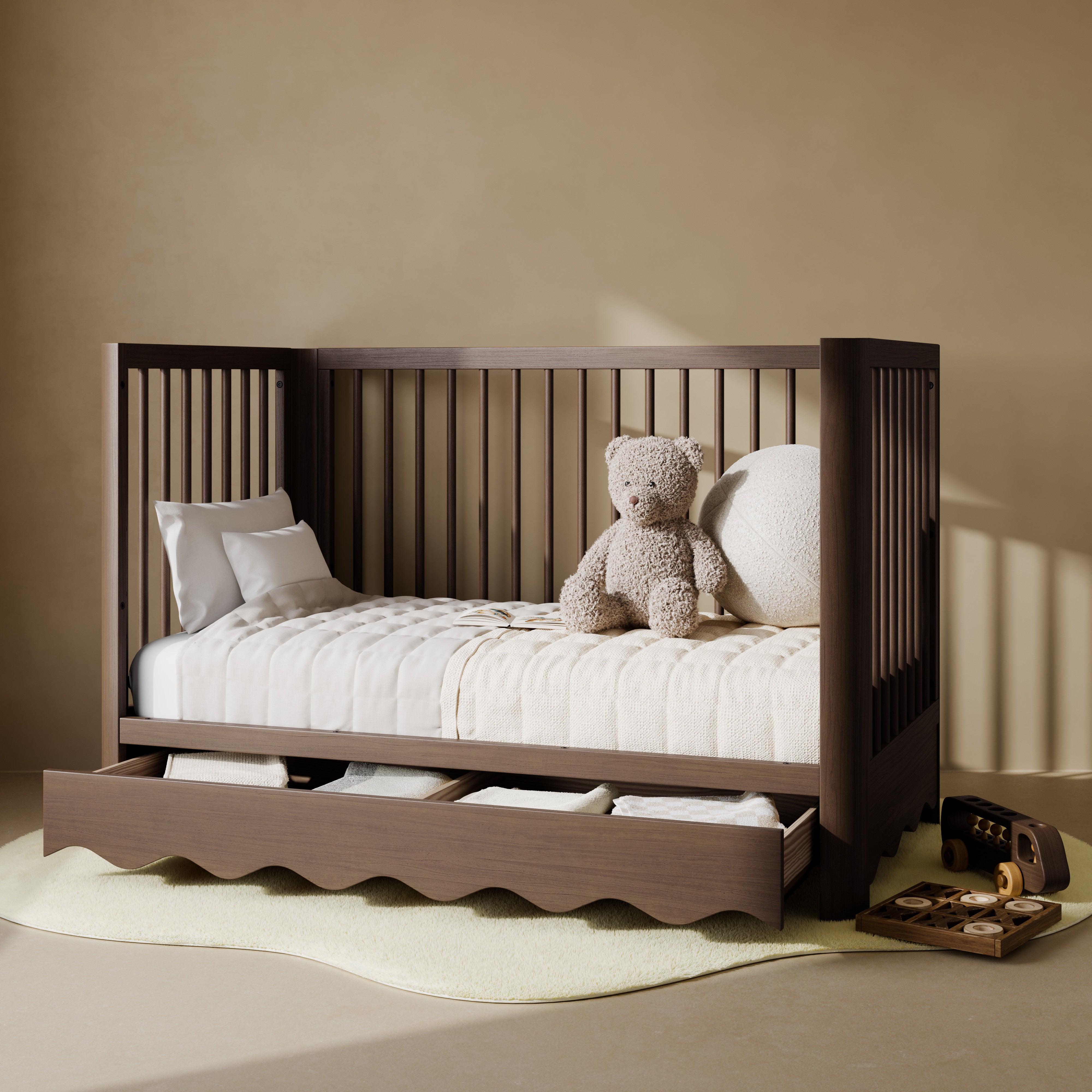Casablanca hazelnut crib with drawer converted to daybed in nursery