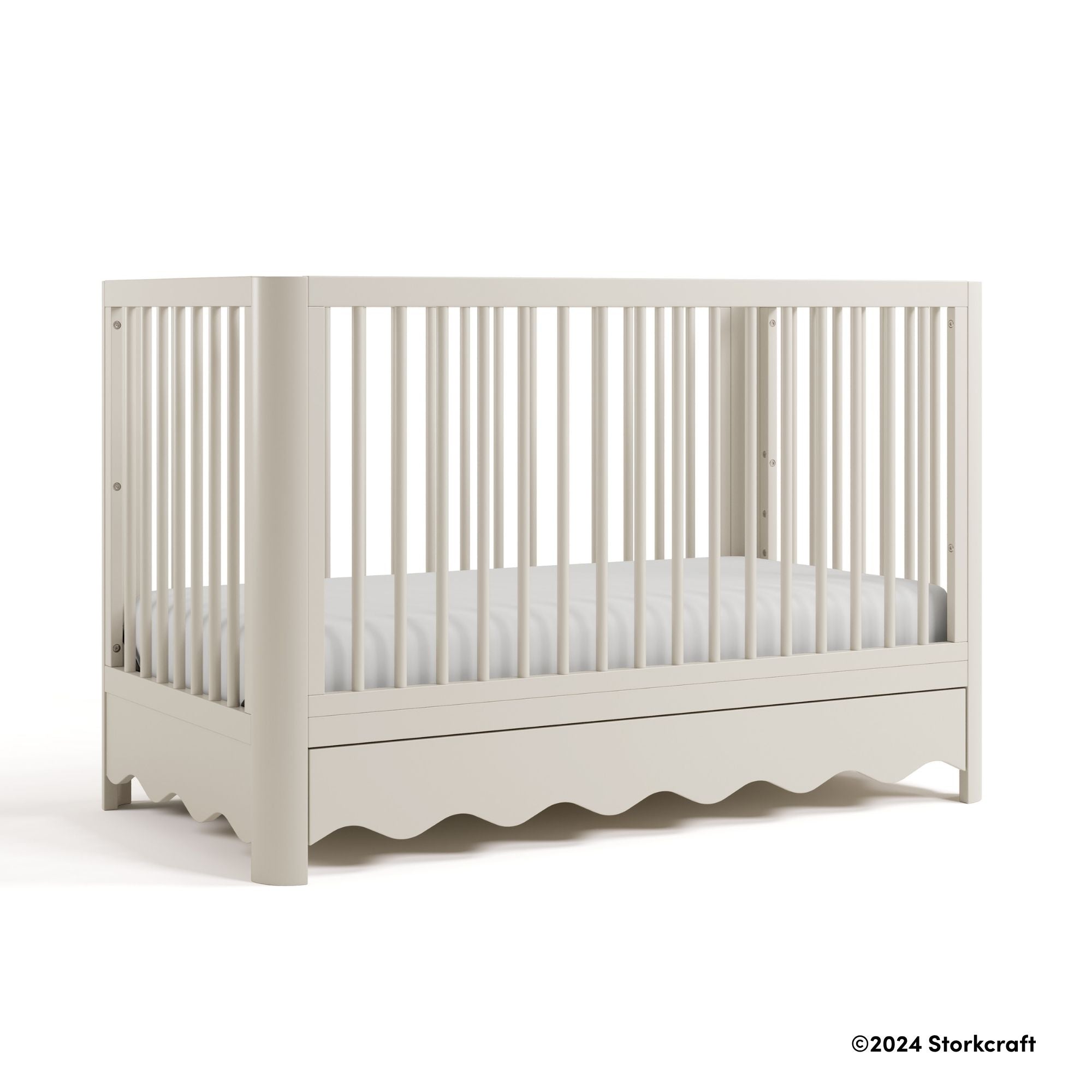 Casablanca frosted oat crib with 2024 Storkcraft copyright on bottom right
