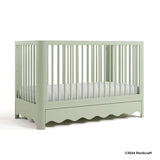 Casablanca sage crib with 2024 Storkcraft copyright on bottom right