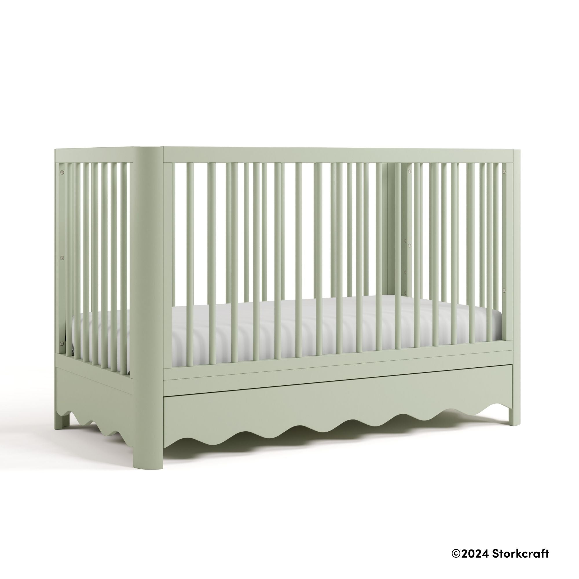 Casablanca sage crib with 2024 Storkcraft copyright on bottom right