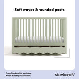 Casablanca sage crib front view showing soft waves and rounded posts callout image