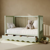 Casablanca sage crib with drawer converted to daybed in nursery