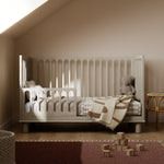 Storkcraft Sicily 3-in-1 Convertible Crib in London Fog toddler bed lifestyle Image