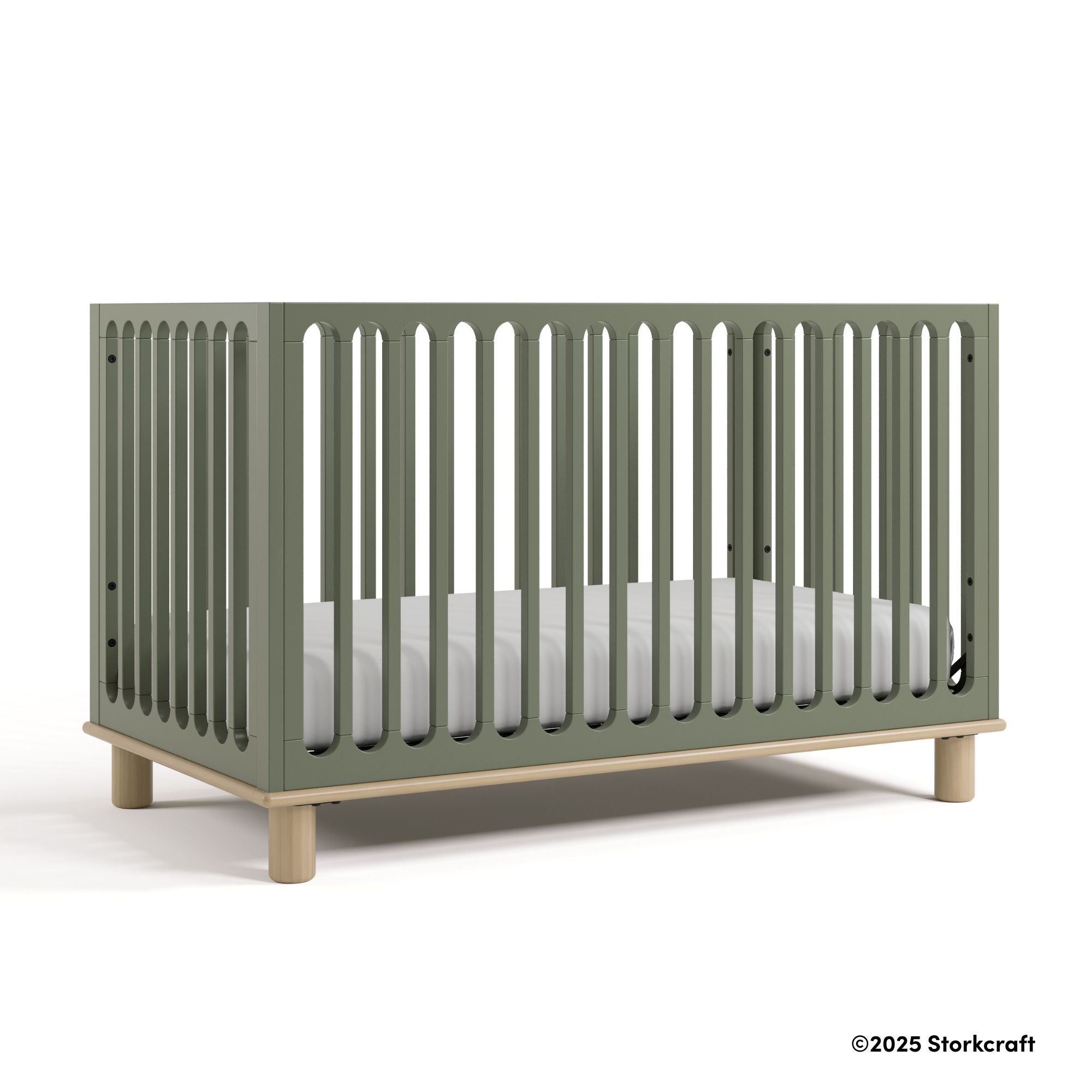 Sicily olive with driftwood crib with 2025 Storkcraft copyright on bottom right