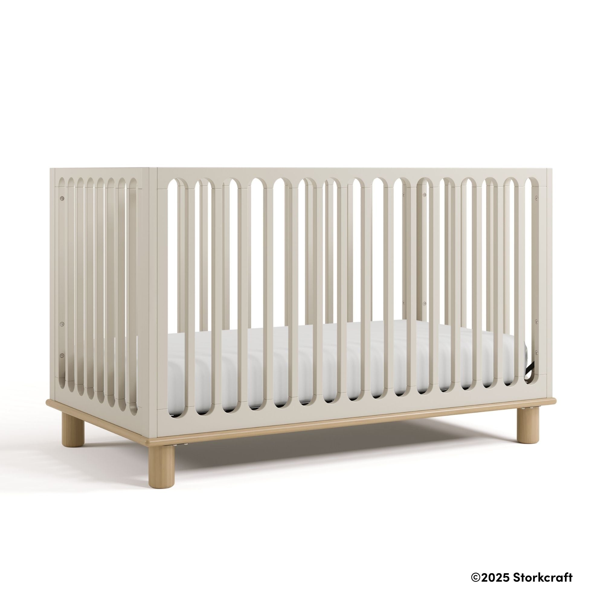 Sicily frosted oat with driftwood crib with 2025 Storkcraft copyright on bottom right