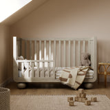 Storkcraft Amalfi Crib in Frosted Oat Toddler Bed stage lifestyle image