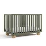 Angle view of Amalfi olive with driftwood crib