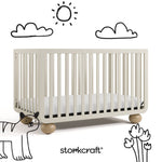 Amalfi frosted oat with driftwood crib with black doodles overlaid on image
