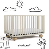 Amalfi frosted oat with driftwood crib with black doodles overlaid on image