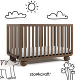 Amalfi hazelnut crib with black doodles overlaid on image
