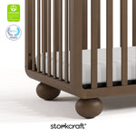 Amalfi hazelnut crib with GGG and PTPA logos on top left