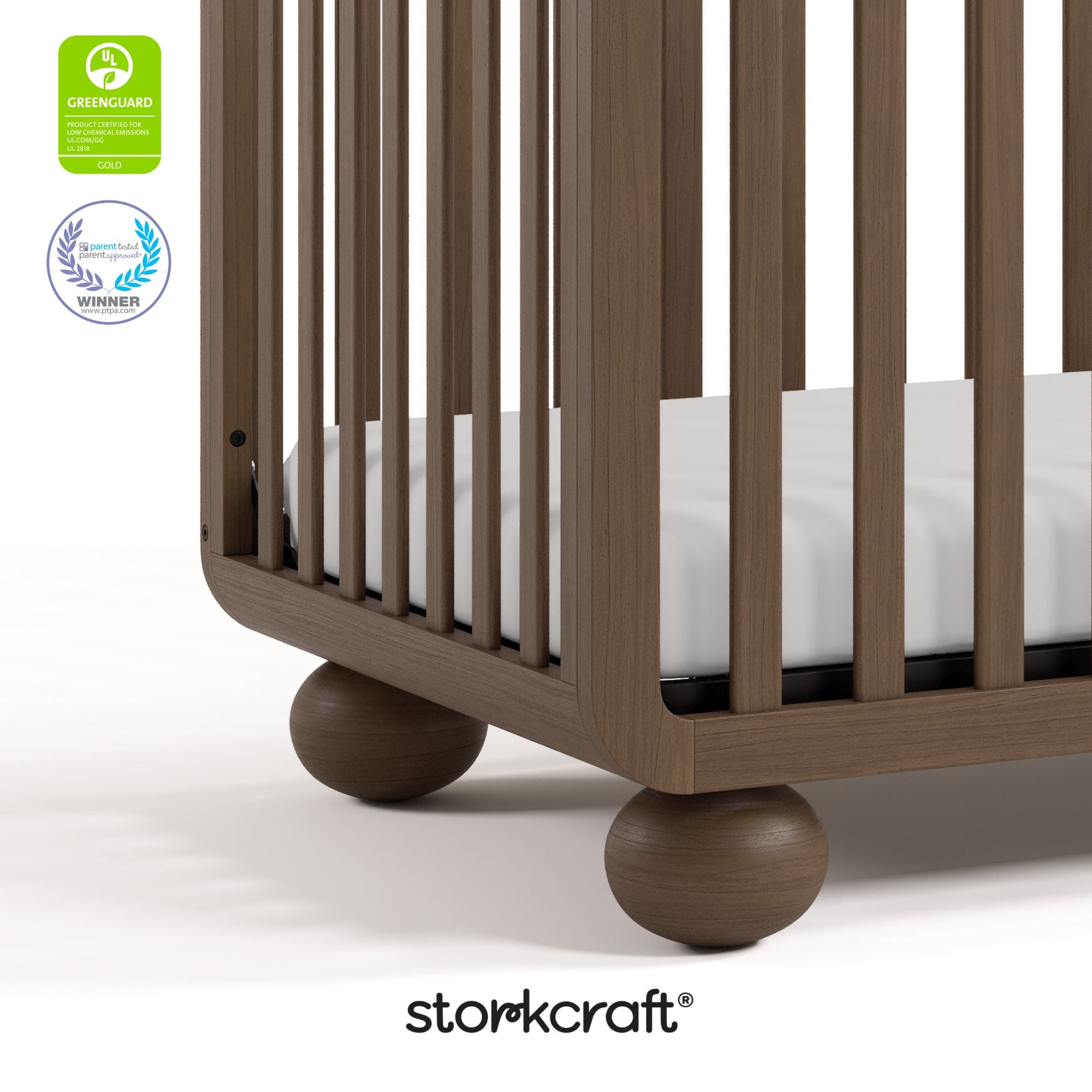 Amalfi hazelnut crib with GGG and PTPA logos on top left