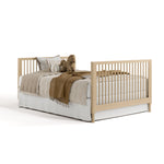 Rio driftwood crib converted to full-size bed with footboard
