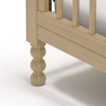 Rio driftwood crib close up of solid wood turning feet