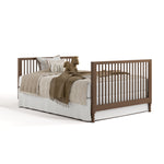 Rio hazelnut crib converted to full-size bed with footboard