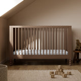 Rio hazelnut crib in a nursery