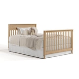 Valencia driftwood crib converted to full bed with footboard