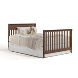Valencia hazelnut crib converted to full bed with footboard
