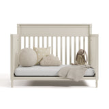 Valencia frosted oat crib converted to daybed