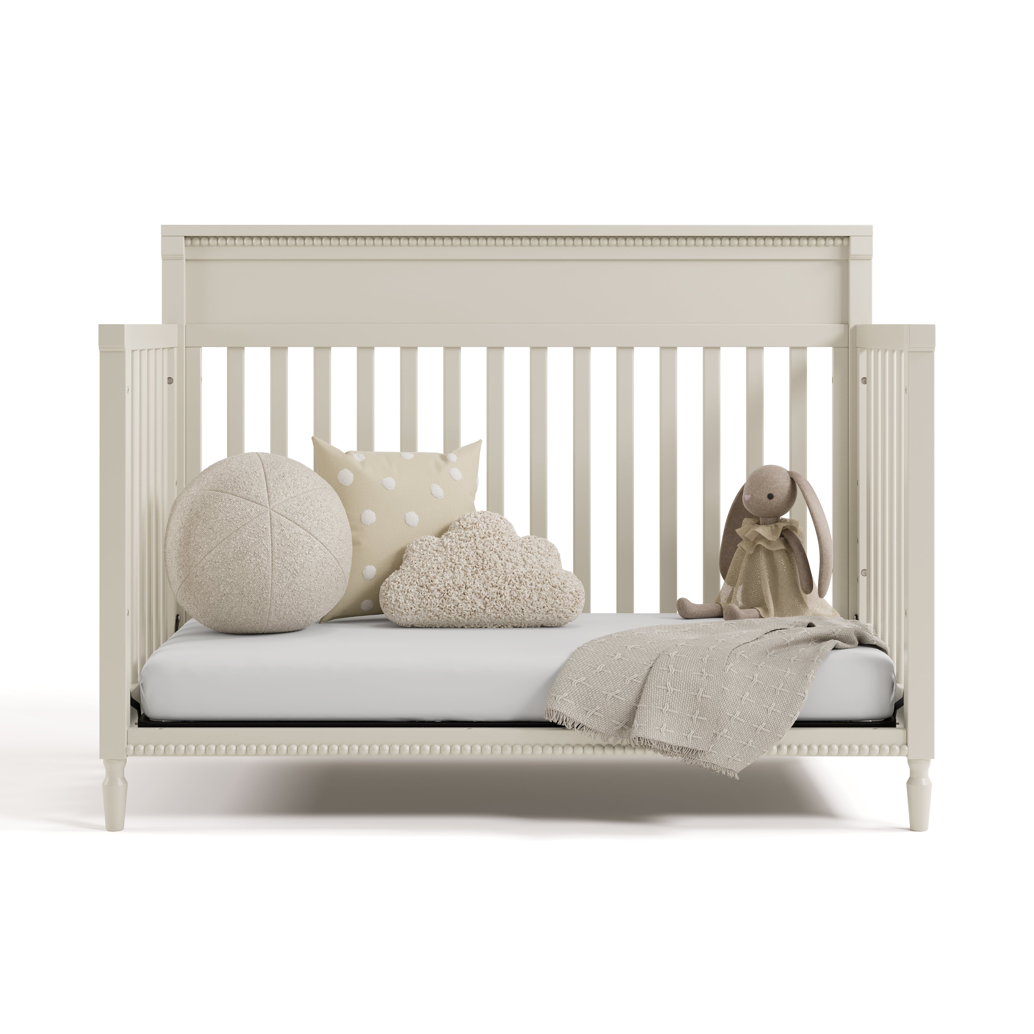 Valencia frosted oat crib converted to daybed