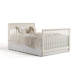 Valencia frosted oat crib converted to full bed with footboard
