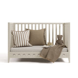 Mallorca frosted oat crib converted to daybed