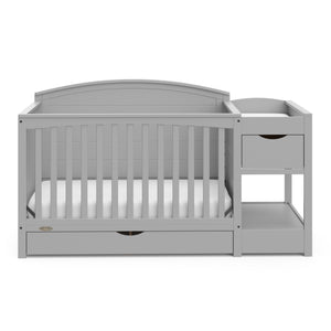 front view of pebble gray crib and changer