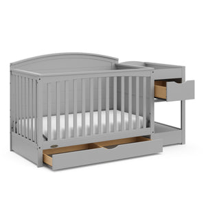 pebble gray convertible crib and changer with open drawers