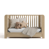 Read-with-Me driftwood crib with drawer converted to daybed