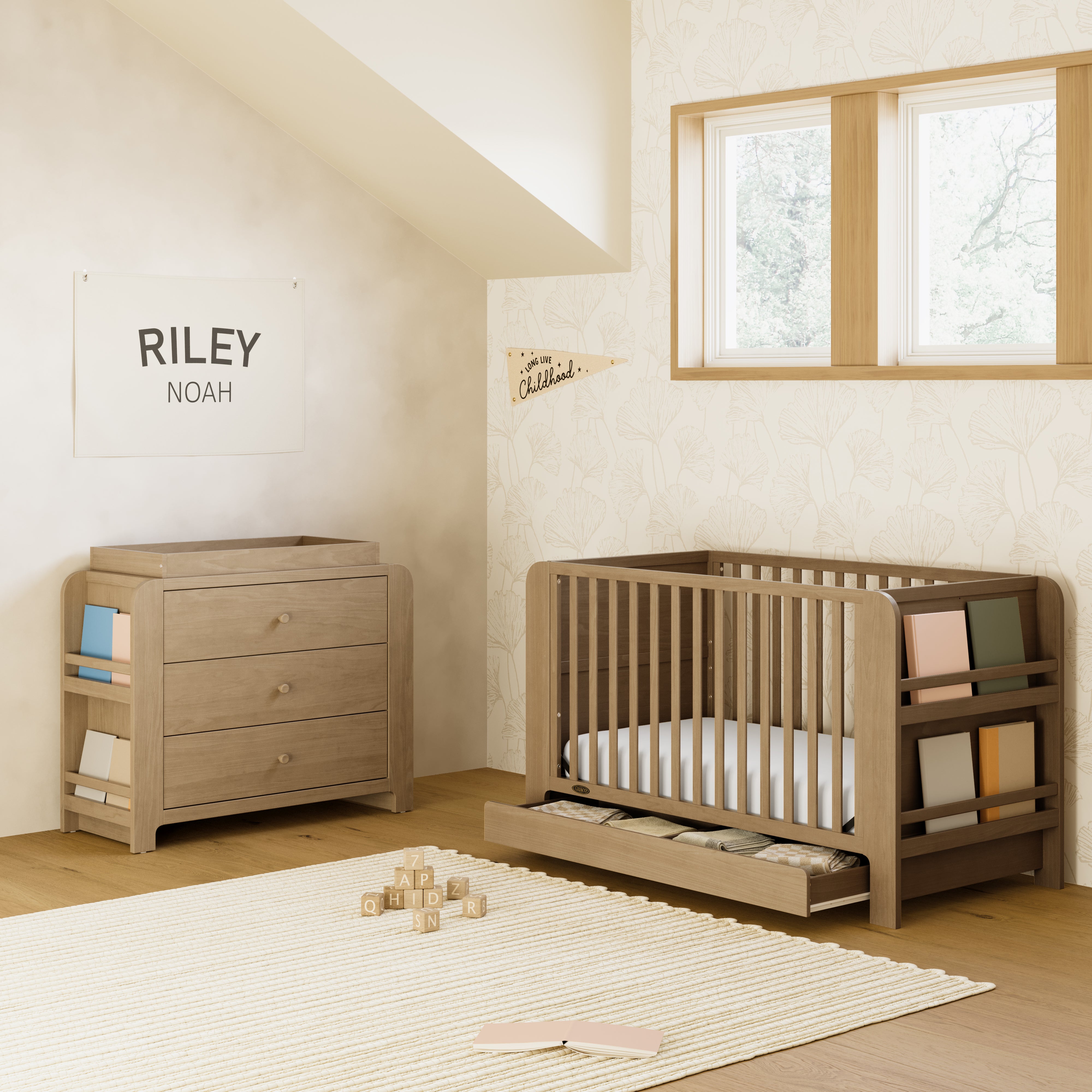 Read-with-Me driftwood crib with drawer next to chest in a nursery
