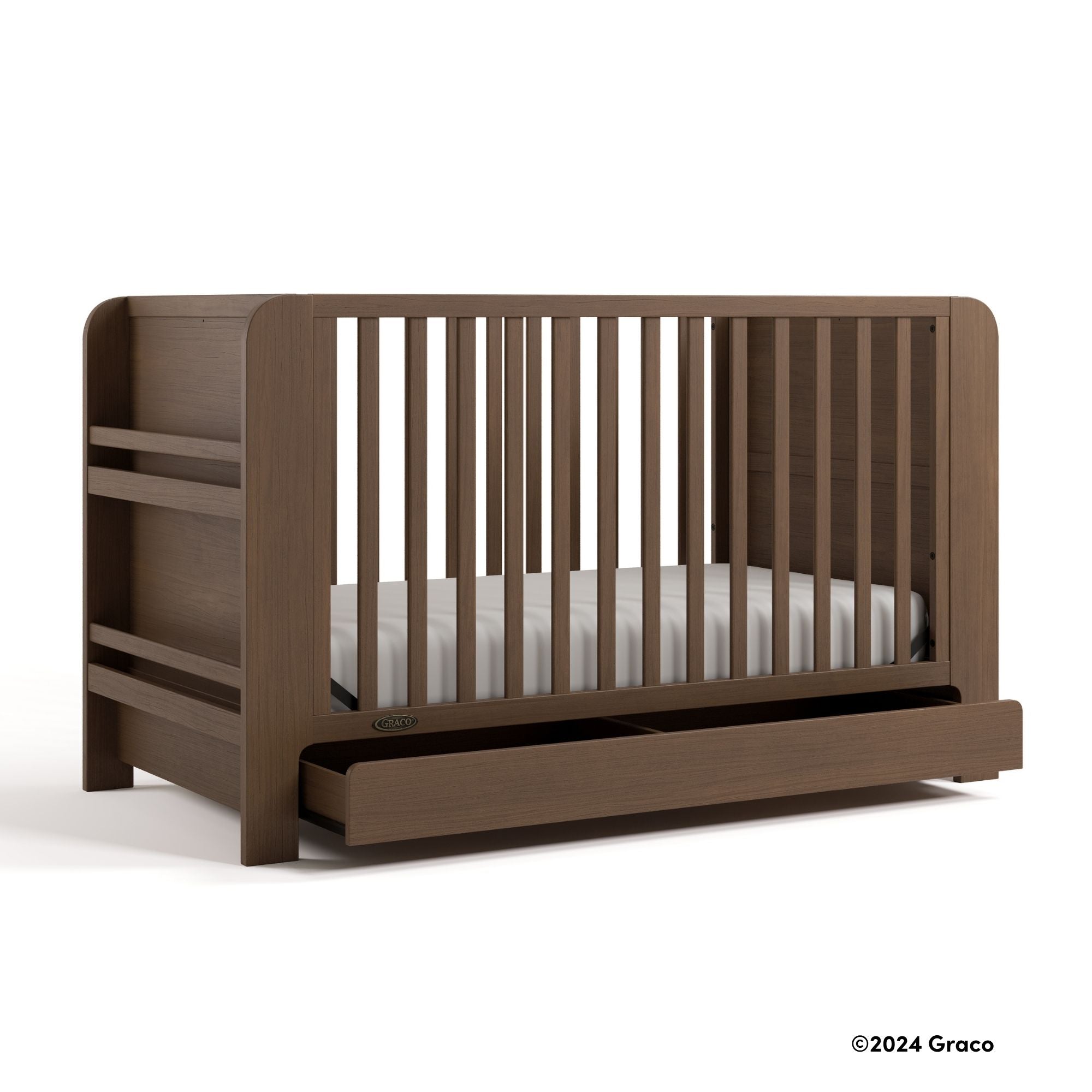 Read-with-me hazelnut crib with 2024 Graco copyright on bottom right