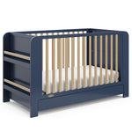 Graco Read-with-Me midnight blue with driftwood crib angle view
