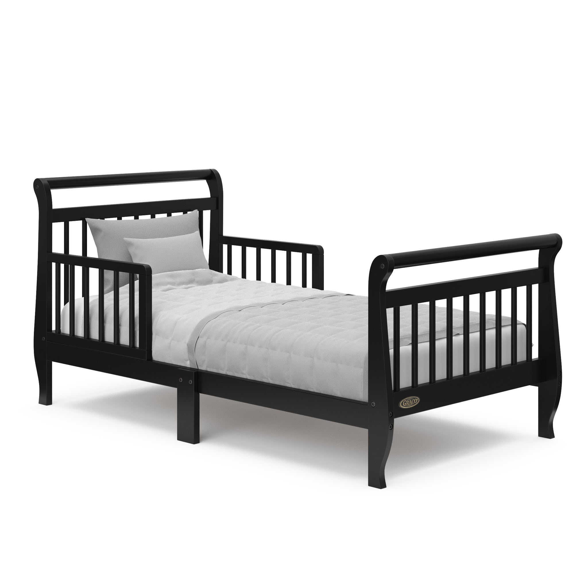 black toddler bed with guardrails and bedding