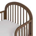 Olivia hazelnut toddler bed close up of headboard