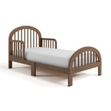 Olivia hazelnut toddler bed angle view