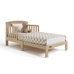 Benton driftwood toddler bed with bedding angle view