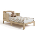 Benton driftwood toddler bed with bedding angle view