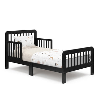 black toddler bed with bedding