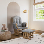 storkcraft hoop glider and ottoman natural frame with light gray cushions in nursery