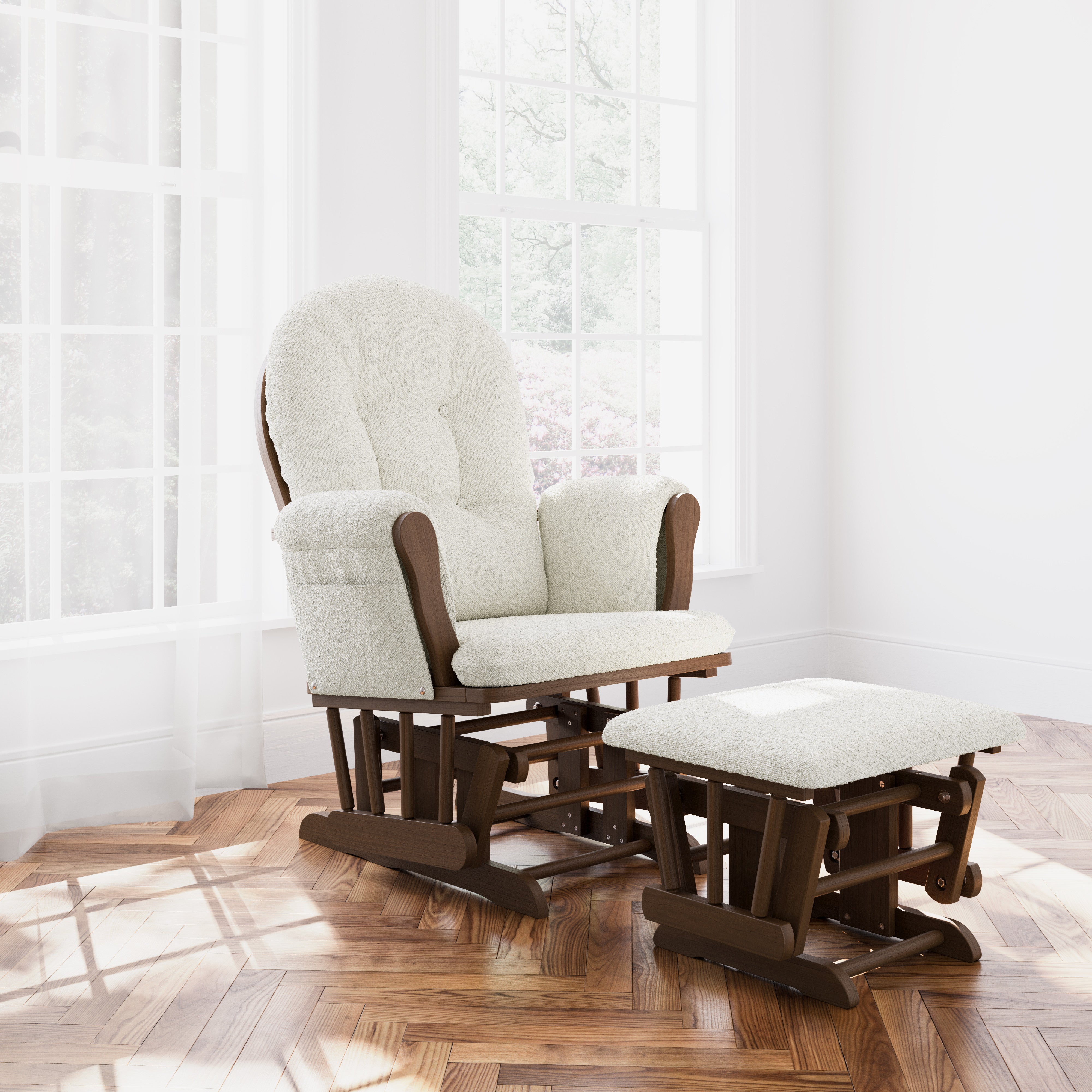 Hoop hazelnut with ivory boucle glider and ottoman in a nursery
