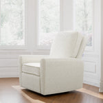 amalfi ivory boucle power recliner in nursery by windows