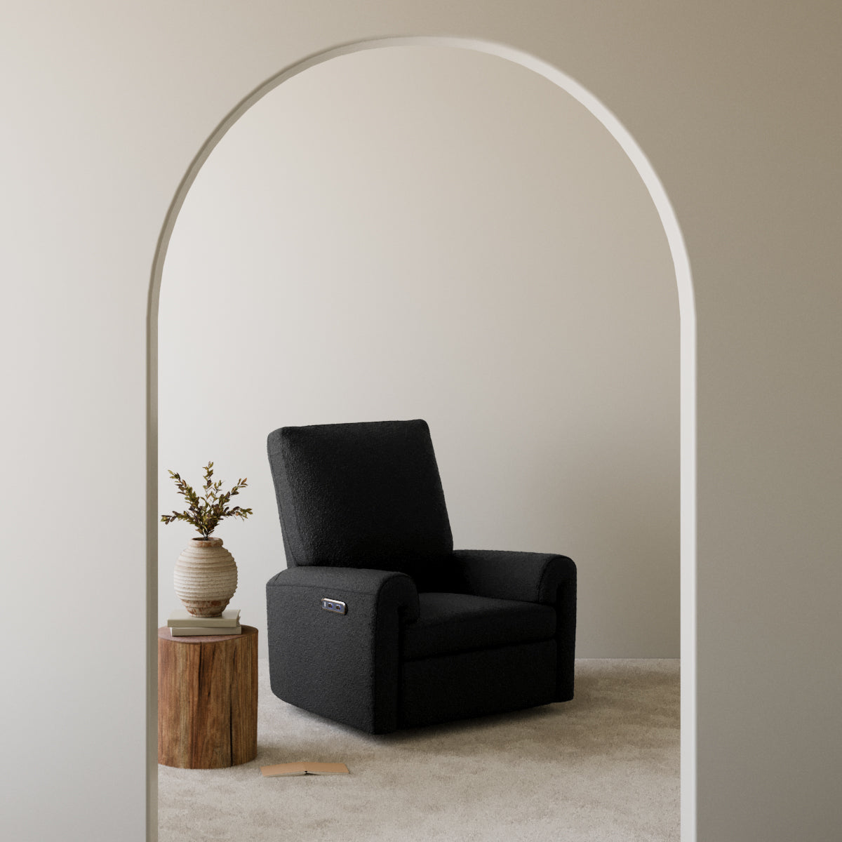 Sorrento black boucle glider in a nursery