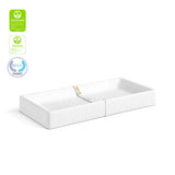 nest changing pad with certification logos on top left