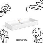 nest changing pad with black drawings overlaid on image