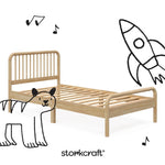 Side view of twin bed without mattress, with doodle graphics on the image