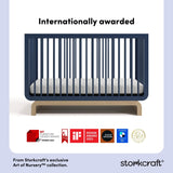 Santorini midnight blue with driftwood crib awards callout