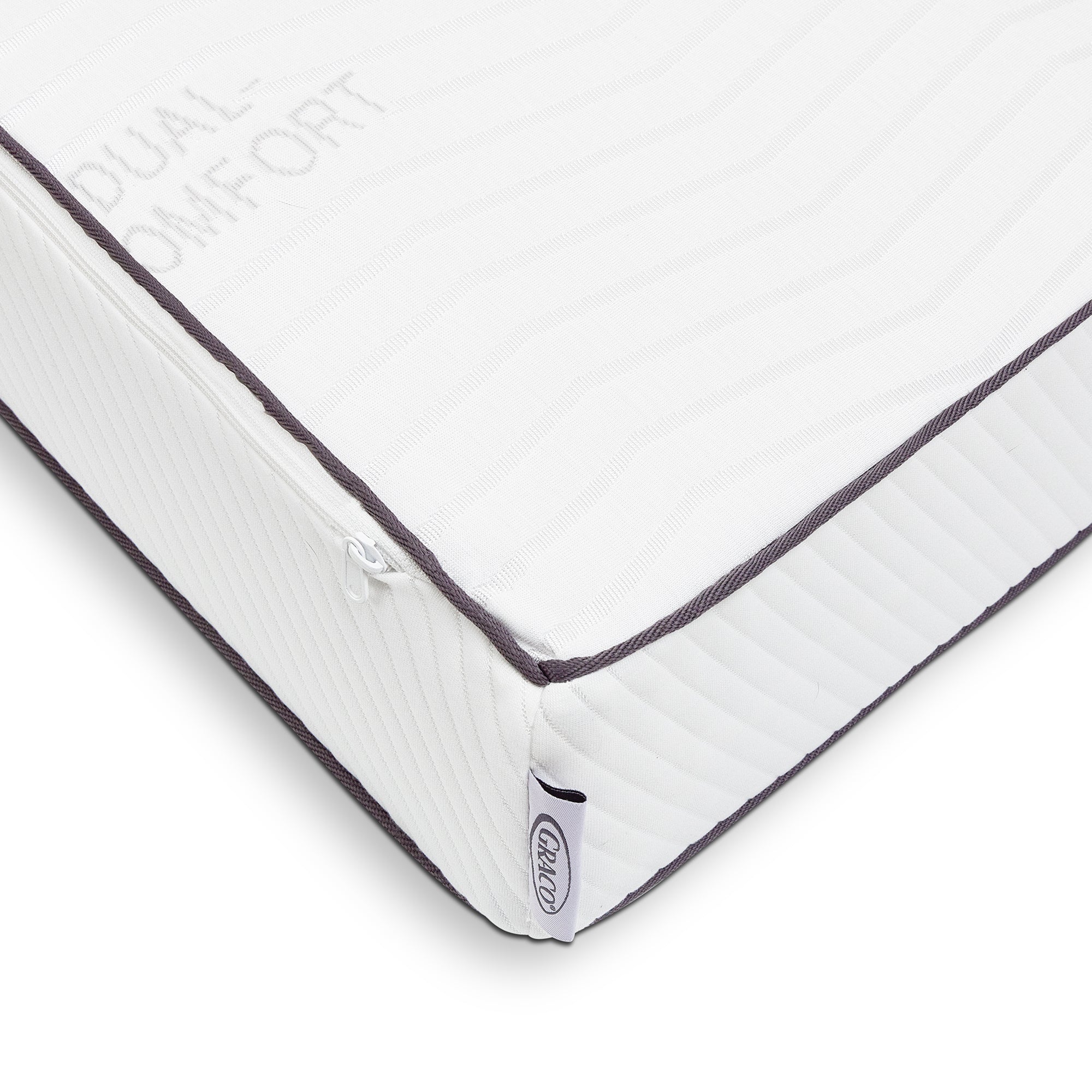 Graco Dual Comfort mattress close up of corner with zipper and Graco brand tag